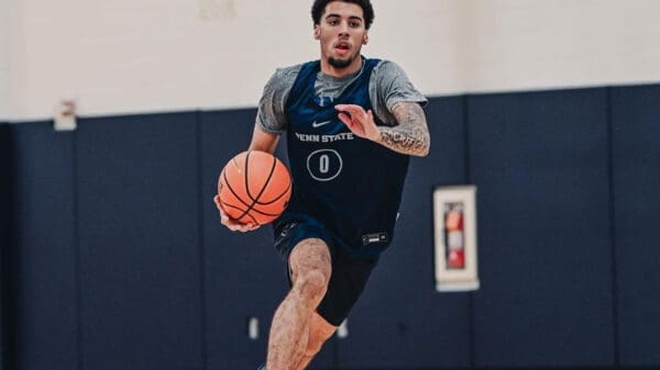 Jahvin Carter driving to the basket.