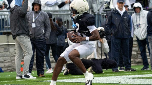 Transfer receiver Zay Robinson scores during 7-on7.